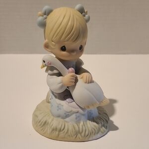 1999 Limited Edition Precious Moments Figurine Holding Swan